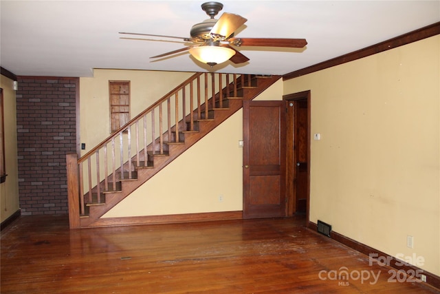 426/432 Maple St, Brevard, NC 28712 - unfurnished living room featuring stairway, wood finished floors, baseboards, and a ceiling fan