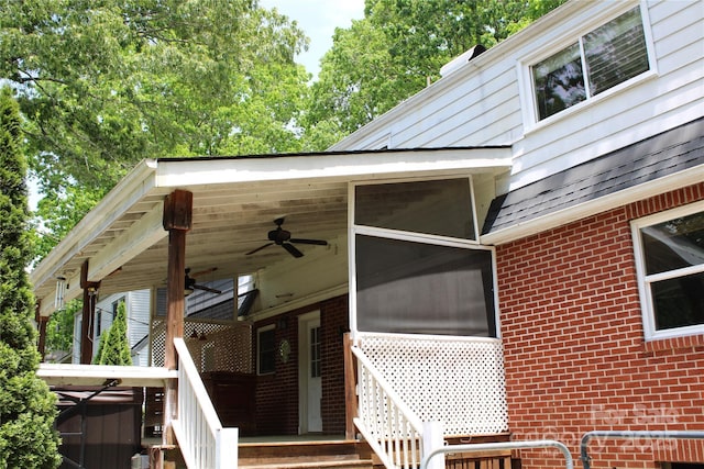426/432 Maple St, Brevard, NC 28712 - view of property exterior featuring brick siding and ceiling fan
