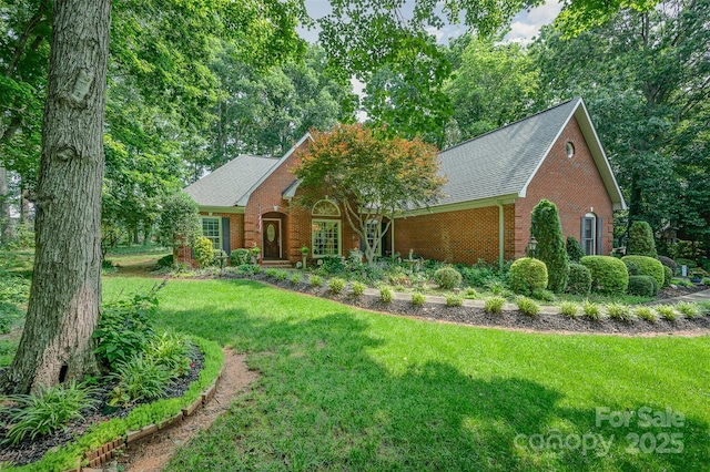 5208 Black Oak Ln, Waxhaw, NC 28173 - view of front of property featuring brick siding, a front yard, and a shingled roof