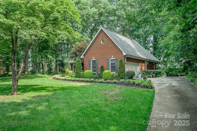 5208 Black Oak Ln, Waxhaw, NC 28173 - view of front of home featuring brick siding, a garage, concrete driveway, a front lawn, and roof with shingles