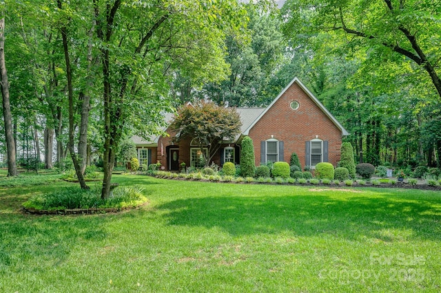 5208 Black Oak Ln, Waxhaw, NC 28173 - view of front of home with a front yard and brick siding