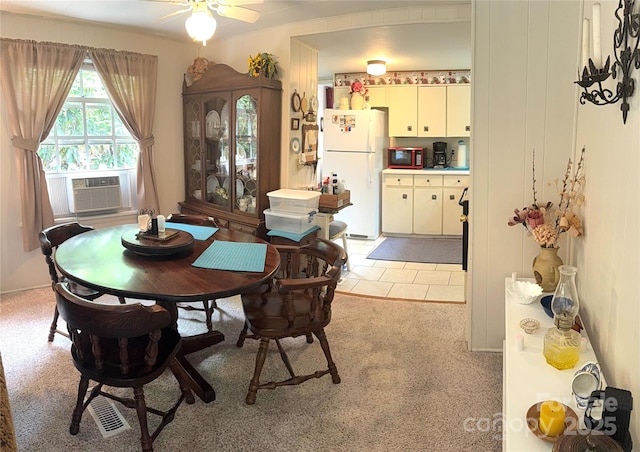 184 Fair Park Dr, Blowing Rock, NC 28605 - dining area featuring ceiling fan, light carpet, and cooling unit