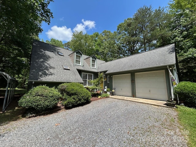 2815 Penny Park Dr, Gastonia, NC 28052 - view of front of property featuring driveway, an attached garage, and roof with shingles