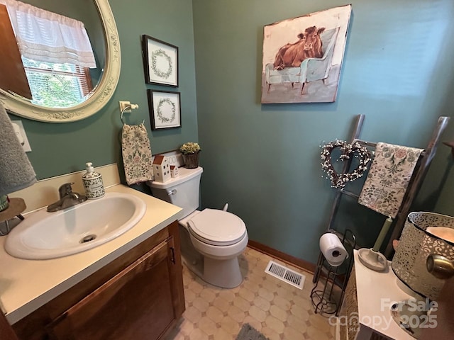 2815 Penny Park Dr, Gastonia, NC 28052 - bathroom featuring toilet, tile patterned floors, vanity, and baseboards