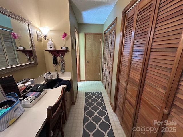 2815 Penny Park Dr, Gastonia, NC 28052 - hallway with light flooring and a textured ceiling