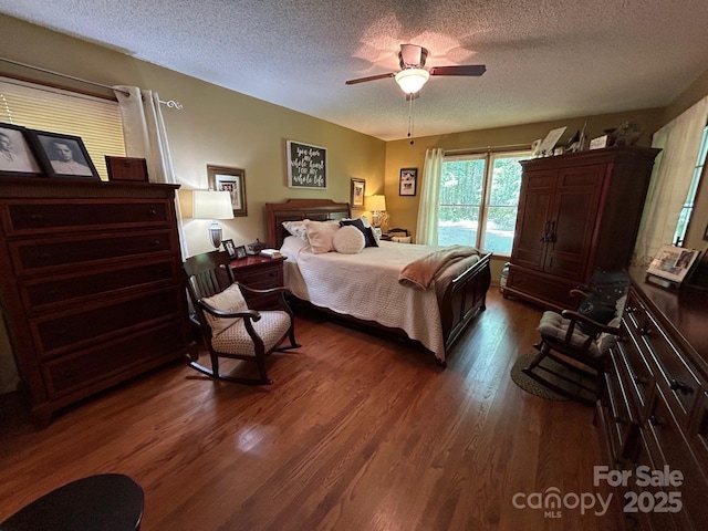 2815 Penny Park Dr, Gastonia, NC 28052 - bedroom featuring dark wood-style floors, a textured ceiling, access to exterior, and a ceiling fan