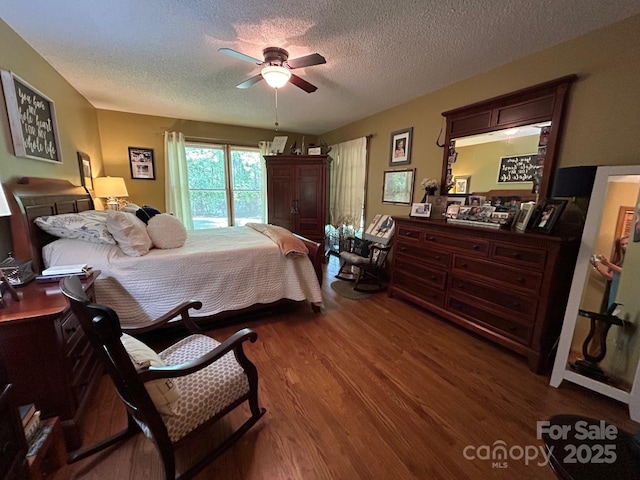 2815 Penny Park Dr, Gastonia, NC 28052 - bedroom with wood finished floors, a textured ceiling, access to outside, and a ceiling fan