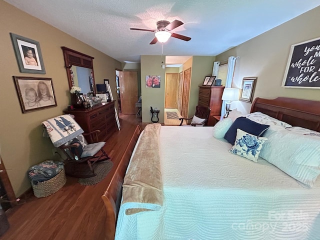 2815 Penny Park Dr, Gastonia, NC 28052 - bedroom with wood finished floors, ceiling fan, and a textured ceiling