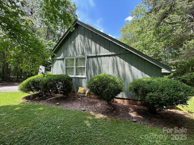 2815 Penny Park Dr, Gastonia, NC 28052 - view of property exterior featuring a yard and board and batten siding