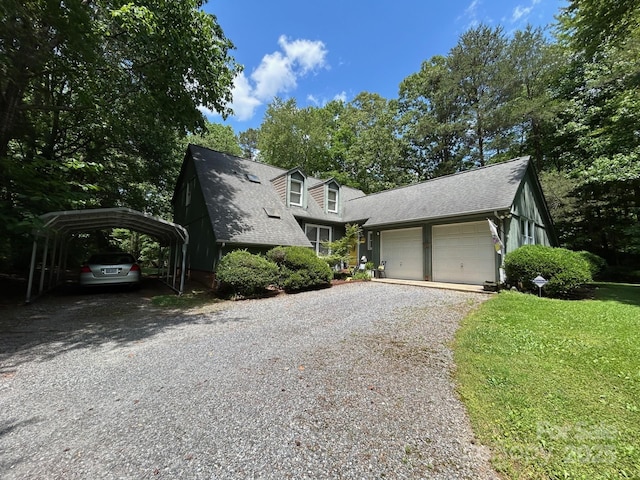 2815 Penny Park Dr, Gastonia, NC 28052 - view of front of house featuring driveway, an attached garage, roof with shingles, a front yard, and a carport