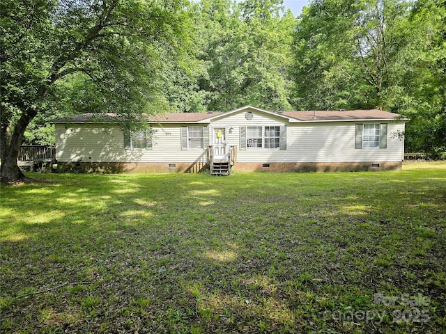 219 Watterson Rd, Grover, NC 28073 - manufactured / mobile home featuring crawl space, a front lawn, and a shingled roof