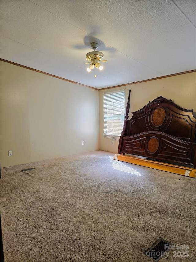219 Watterson Rd, Grover, NC 28073 - unfurnished room with crown molding, a ceiling fan, carpet flooring, and a textured ceiling
