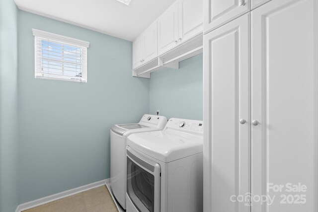 3918 Halcyon Dr, Huntersville, NC 28078 - laundry area featuring cabinet space, washing machine and dryer, baseboards, and light tile patterned flooring