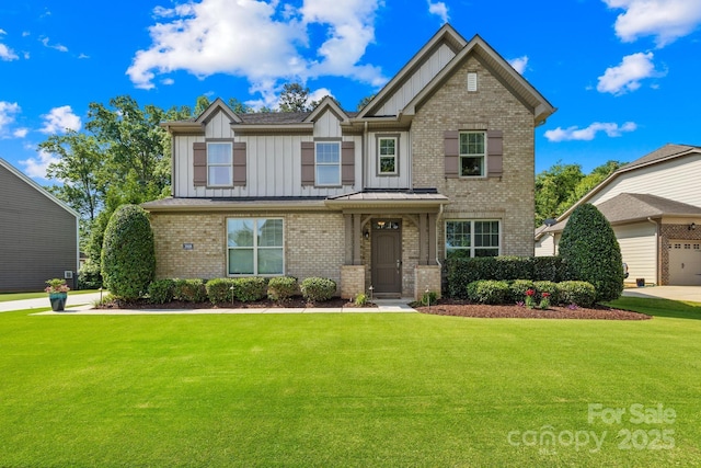 3918 Halcyon Dr, Huntersville, NC 28078 - view of front of house with board and batten siding, brick siding, and a front lawn