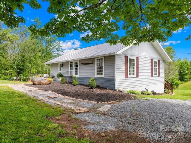 16 Julep Dr, Alexander, NC 28701 - view of front of home with a front lawn and metal roof