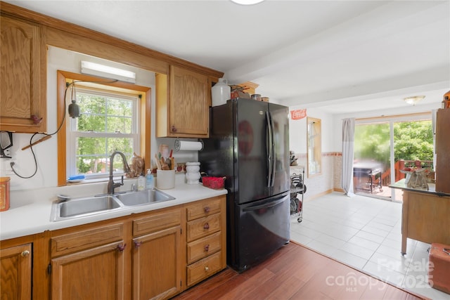 16 Julep Dr, Alexander, NC 28701 - kitchen featuring freestanding refrigerator, a sink, healthy amount of natural light, and light countertops