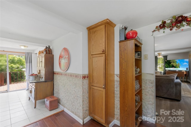16 Julep Dr, Alexander, NC 28701 - hallway with plenty of natural light, wainscoting, and wood finished floors