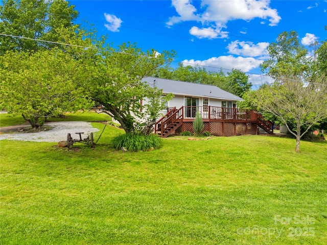 16 Julep Dr, Alexander, NC 28701 - view of grassy yard featuring stairway and a wooden deck