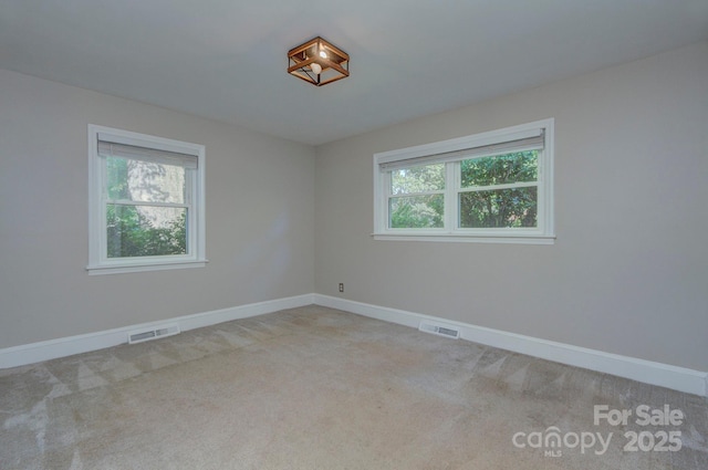 3951 Whitehall Dr, Charlotte, NC 28208 - carpeted spare room with baseboards