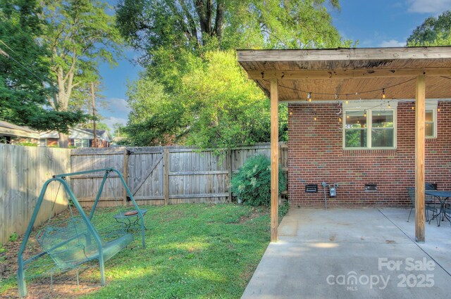 3951 Whitehall Dr, Charlotte, NC 28208 - view of yard featuring a patio area