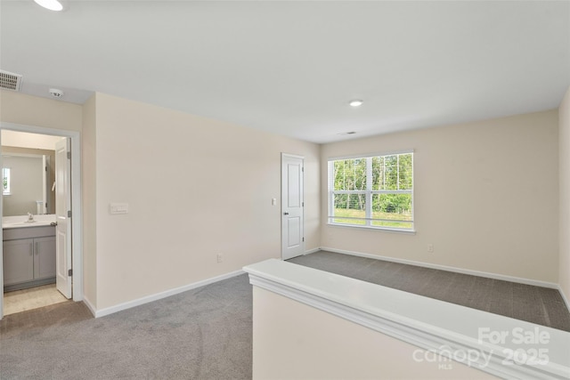 383 Ridgeview Ln, Mars Hill, NC 28754 - spare room featuring light carpet, baseboards, a smoke detector, and recessed lighting