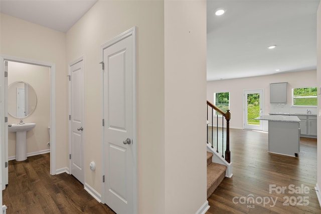 383 Ridgeview Ln, Mars Hill, NC 28754 - hallway featuring dark wood-type flooring, a sink, stairs, recessed lighting, and baseboards