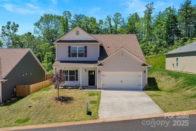 383 Ridgeview Ln, Mars Hill, NC 28754 - traditional-style home with a garage, driveway, and a shingled roof