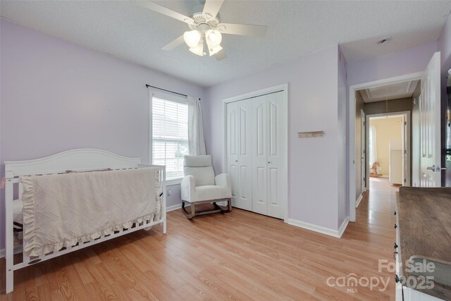 2023 E Park Dr, Lancaster, SC 29720 - bedroom featuring attic access, wood finished floors, baseboards, and a closet