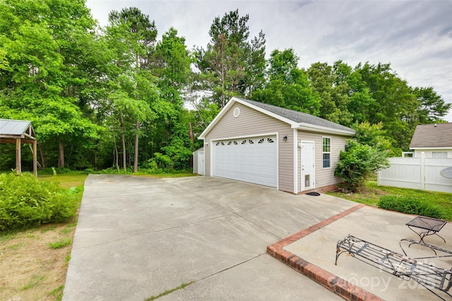 2023 E Park Dr, Lancaster, SC 29720 - detached garage with view of wooded area
