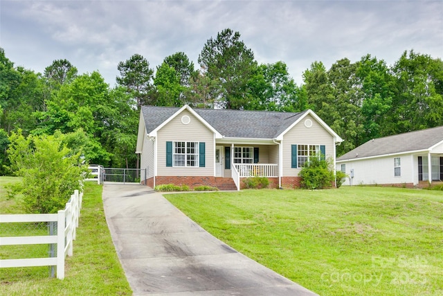2023 E Park Dr, Lancaster, SC 29720 - single story home with covered porch, concrete driveway, a shingled roof, and crawl space