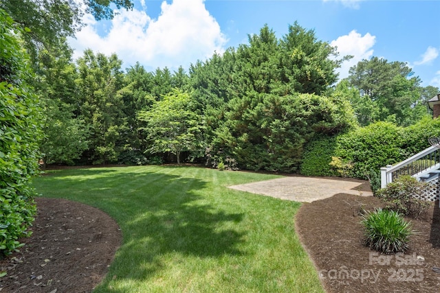 6132 Sharon Rd, Charlotte, NC 28210 - view of green lawn with a patio area