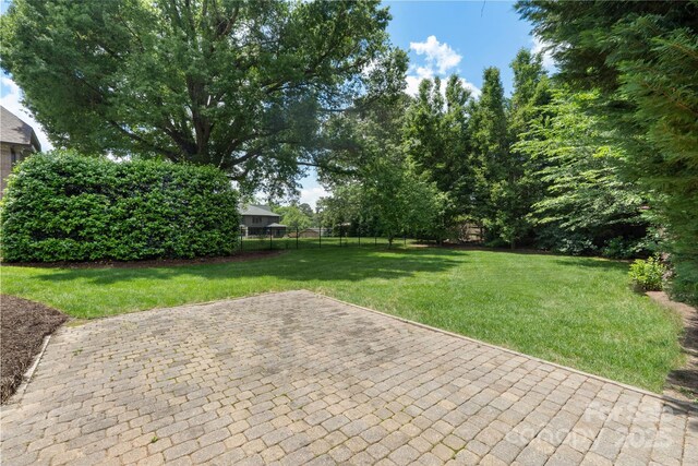 6132 Sharon Rd, Charlotte, NC 28210 - view of yard with a patio area
