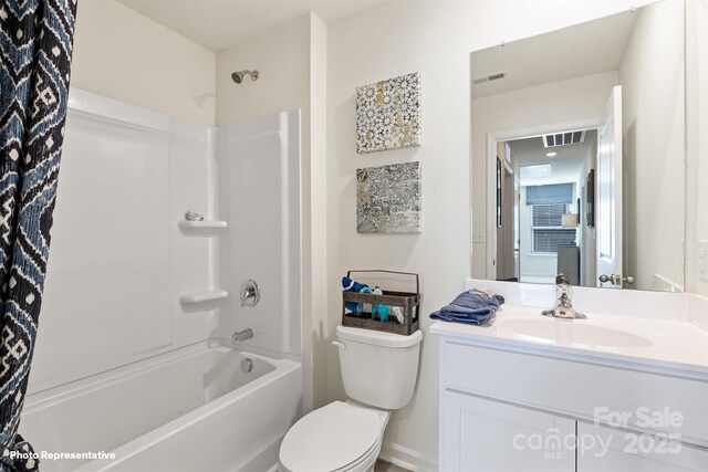 3735 13th St NE, Hickory, NC 28601 - bathroom featuring toilet, vanity, and tub / shower combination