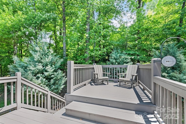 66 Fox Trot Ln, Tryon, NC 28782 - wooden terrace featuring view of scattered trees