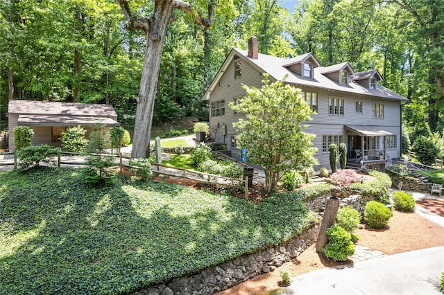 66 Fox Trot Ln, Tryon, NC 28782 - view of front of home featuring a chimney and covered porch