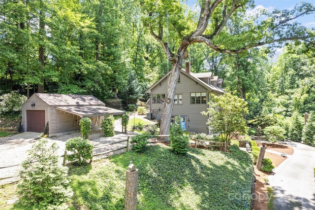 66 Fox Trot Ln, Tryon, NC 28782 - view of front facade with an outbuilding and a chimney