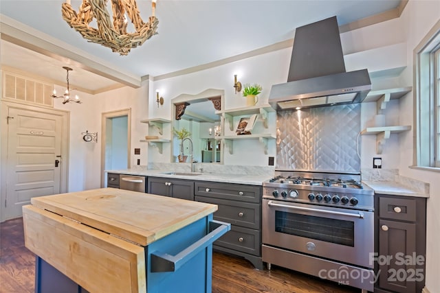 66 Fox Trot Ln, Tryon, NC 28782 - kitchen featuring appliances with stainless steel finishes, wall chimney exhaust hood, a chandelier, open shelves, and wood counters