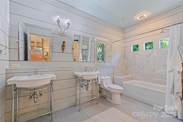 66 Fox Trot Ln, Tryon, NC 28782 - bathroom with toilet and shower / bathtub combination with curtain