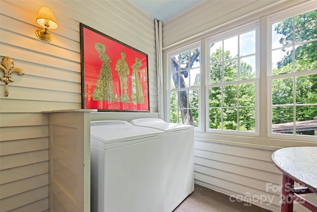 66 Fox Trot Ln, Tryon, NC 28782 - laundry area featuring washer and dryer, wood finished floors, and wooden walls