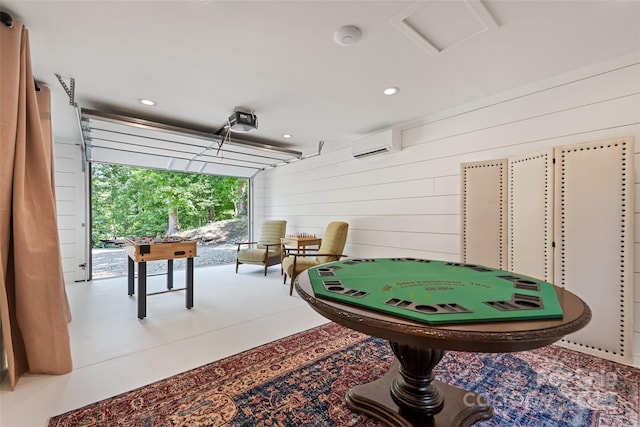66 Fox Trot Ln, Tryon, NC 28782 - game room with a wall unit AC, wood walls, and recessed lighting