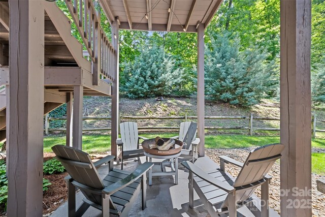 66 Fox Trot Ln, Tryon, NC 28782 - view of patio featuring a fire pit and stairway