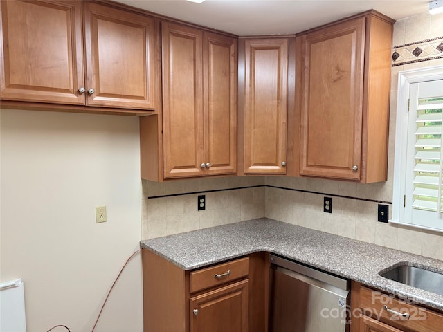 7212 Bradley Ct, Charlotte, NC 28227 - kitchen featuring dishwasher, decorative backsplash, and brown cabinetry