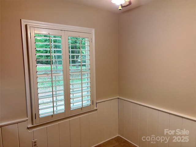 7212 Bradley Ct, Charlotte, NC 28227 - unfurnished room with a wainscoted wall and a decorative wall