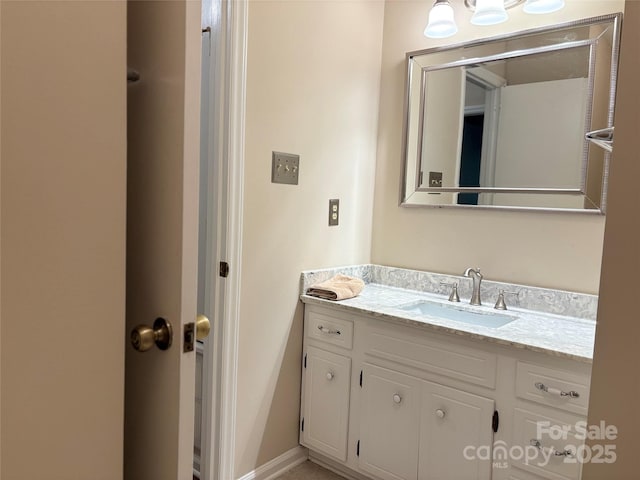 7212 Bradley Ct, Charlotte, NC 28227 - bathroom featuring vanity and baseboards