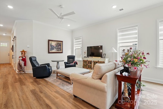 1318 Encore Ln, Waxhaw, NC 28173 - living room with light wood-style floors, ceiling fan, ornamental molding, recessed lighting, and baseboards