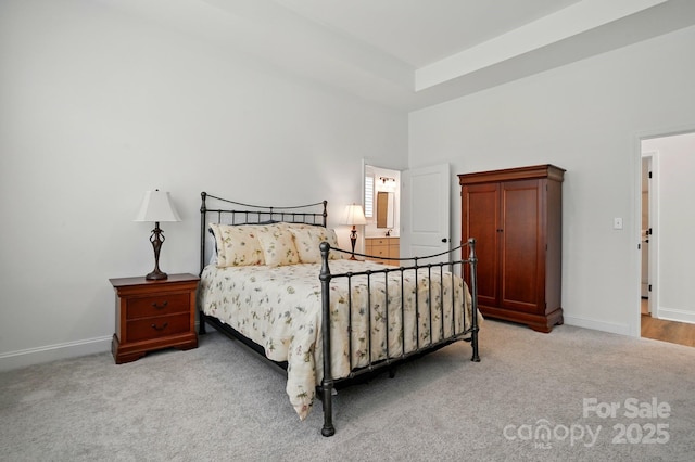 1318 Encore Ln, Waxhaw, NC 28173 - bedroom featuring light colored carpet, a towering ceiling, and baseboards