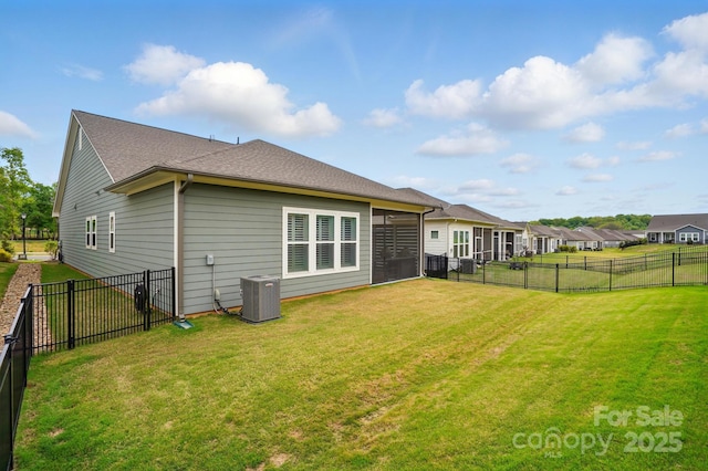 1318 Encore Ln, Waxhaw, NC 28173 - rear view of house featuring a shingled roof and central air condition unit