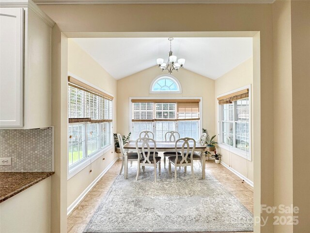 16012 Caranna Ct, Charlotte, NC 28277 - dining area featuring baseboards, a chandelier, plenty of natural light, and vaulted ceiling