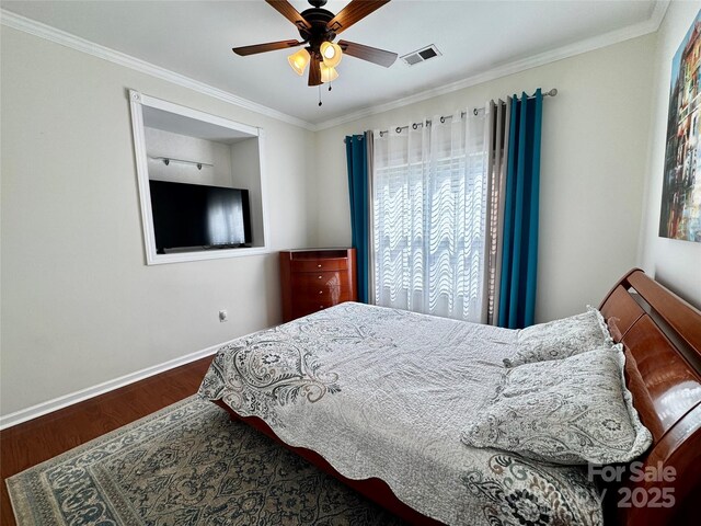 16012 Caranna Ct, Charlotte, NC 28277 - bedroom with wood finished floors, baseboards, crown molding, and ceiling fan