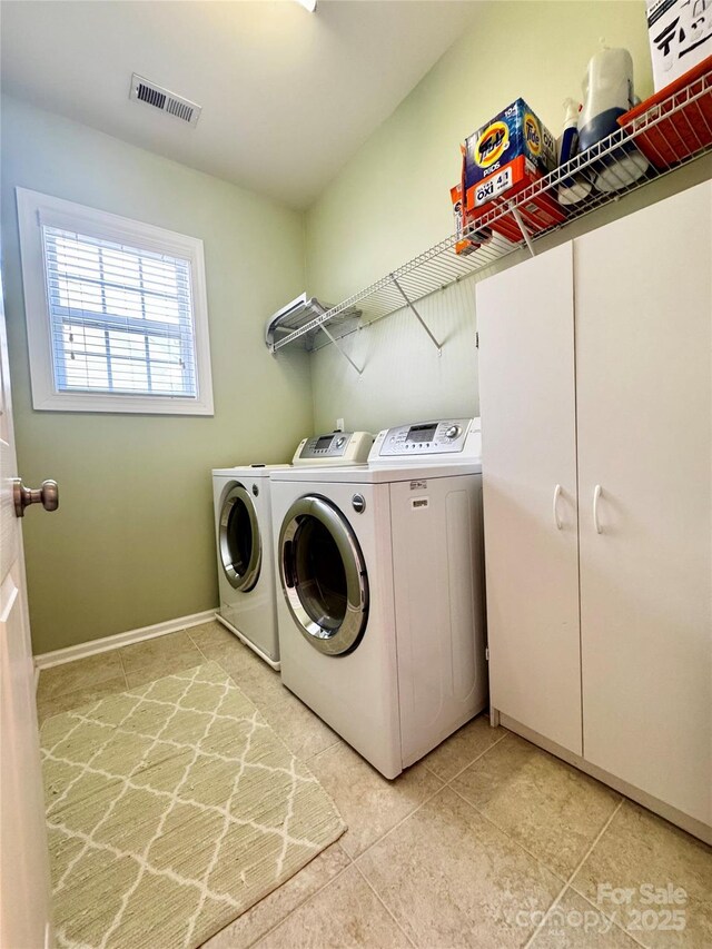 16012 Caranna Ct, Charlotte, NC 28277 - washroom featuring independent washer and dryer, light tile patterned floors, and baseboards
